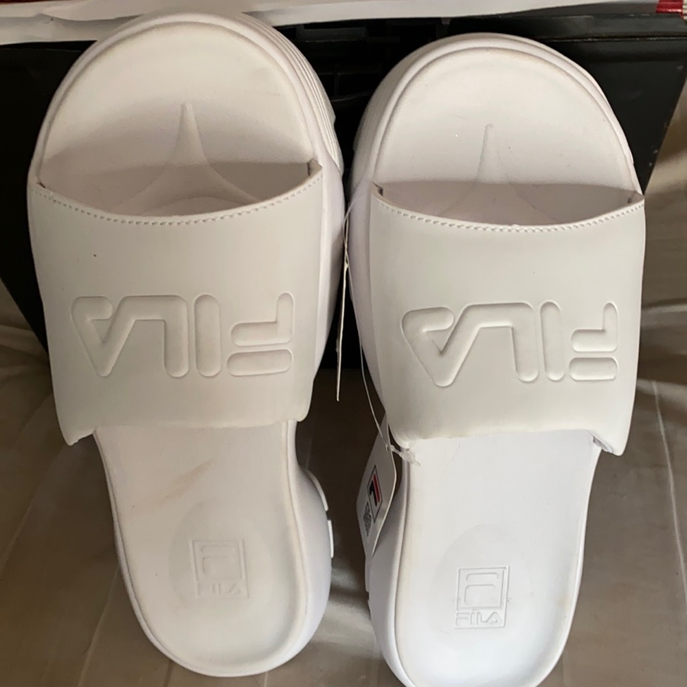 Fila slide on shoes. Brand new and soft